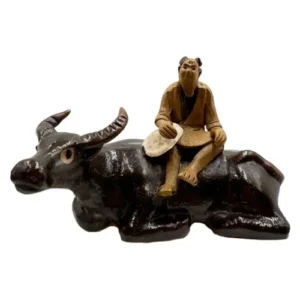 Farmer Sitting on Bull 5cm