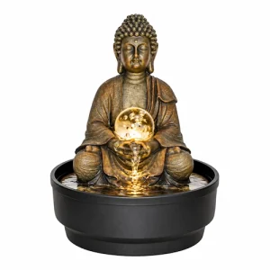Buddhist meditation figure sitting with a glowing orb in its lap, at the centre of a fountain